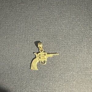 Elegant Gold Gun Pendant